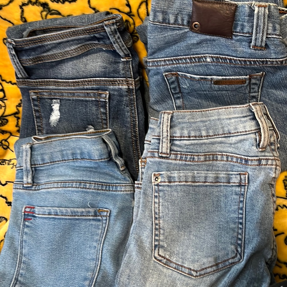 Four pairs of jeans